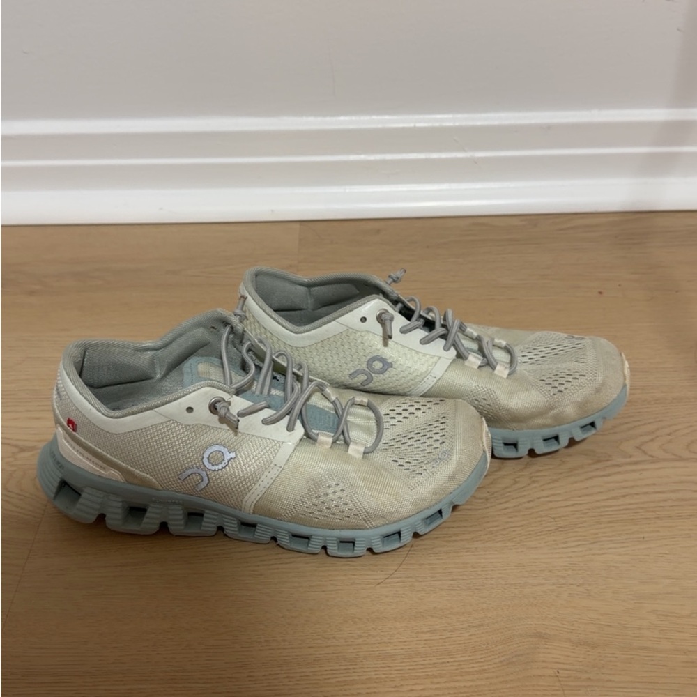 On Running Cream and Gray Athletic Shoes